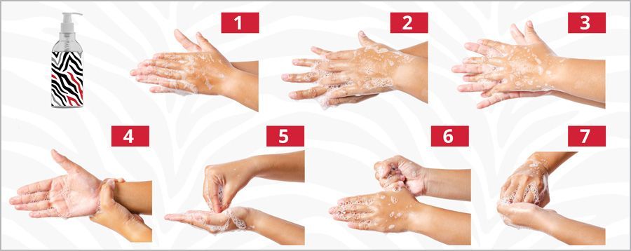 A picture of a person washing their hands with soap.