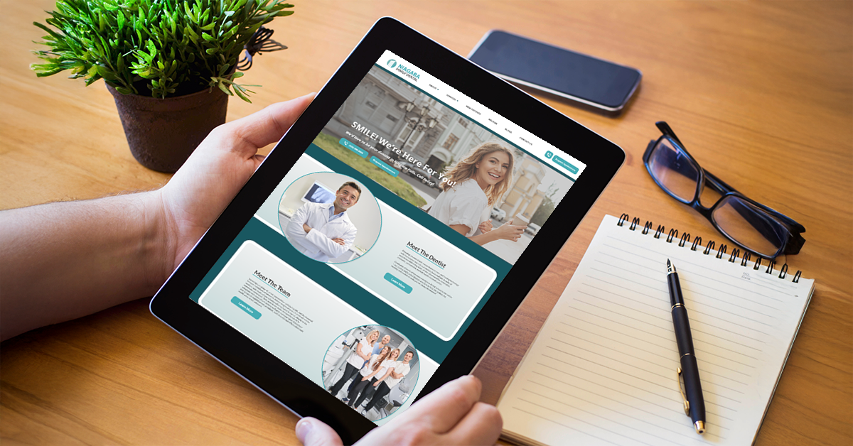 Tablet displaying a modern dental website design showcasing dental SEO services for a dental practice.