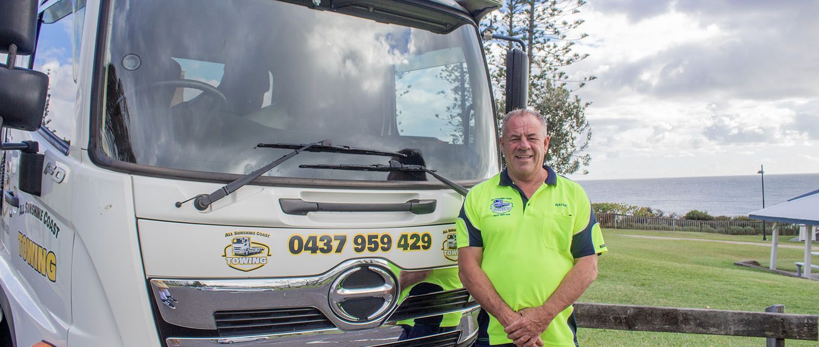 White Flatbed Tow Truck Parked on a Roadside — All Sunshine Coast Towing In Forest Glen, QLD
