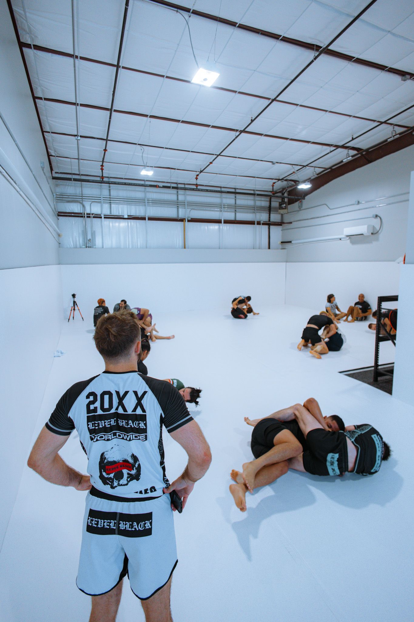 Adults practicing beginner Jiu Jitsu escapes at Jiu Jitsu Hub in Georgetown, Texas for confidence.