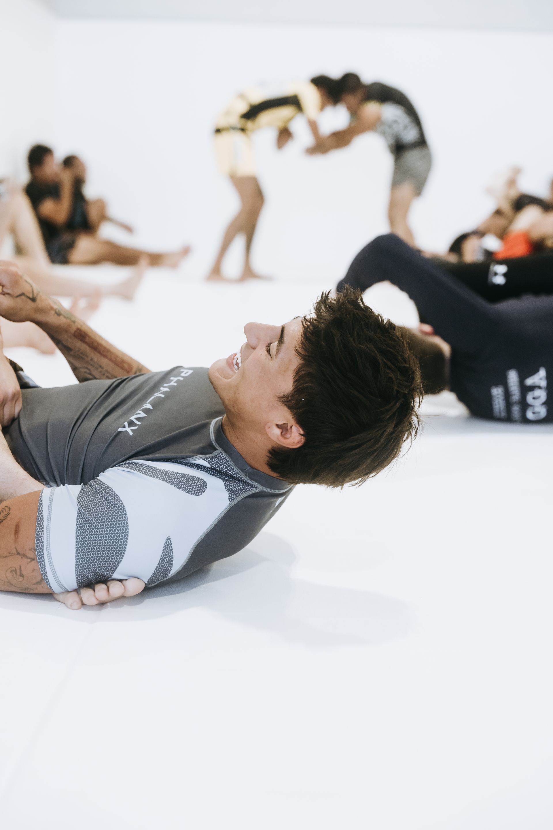 Students practice controlled grappling drills at Jiu Jitsu Hub in Georgetown, Texas.