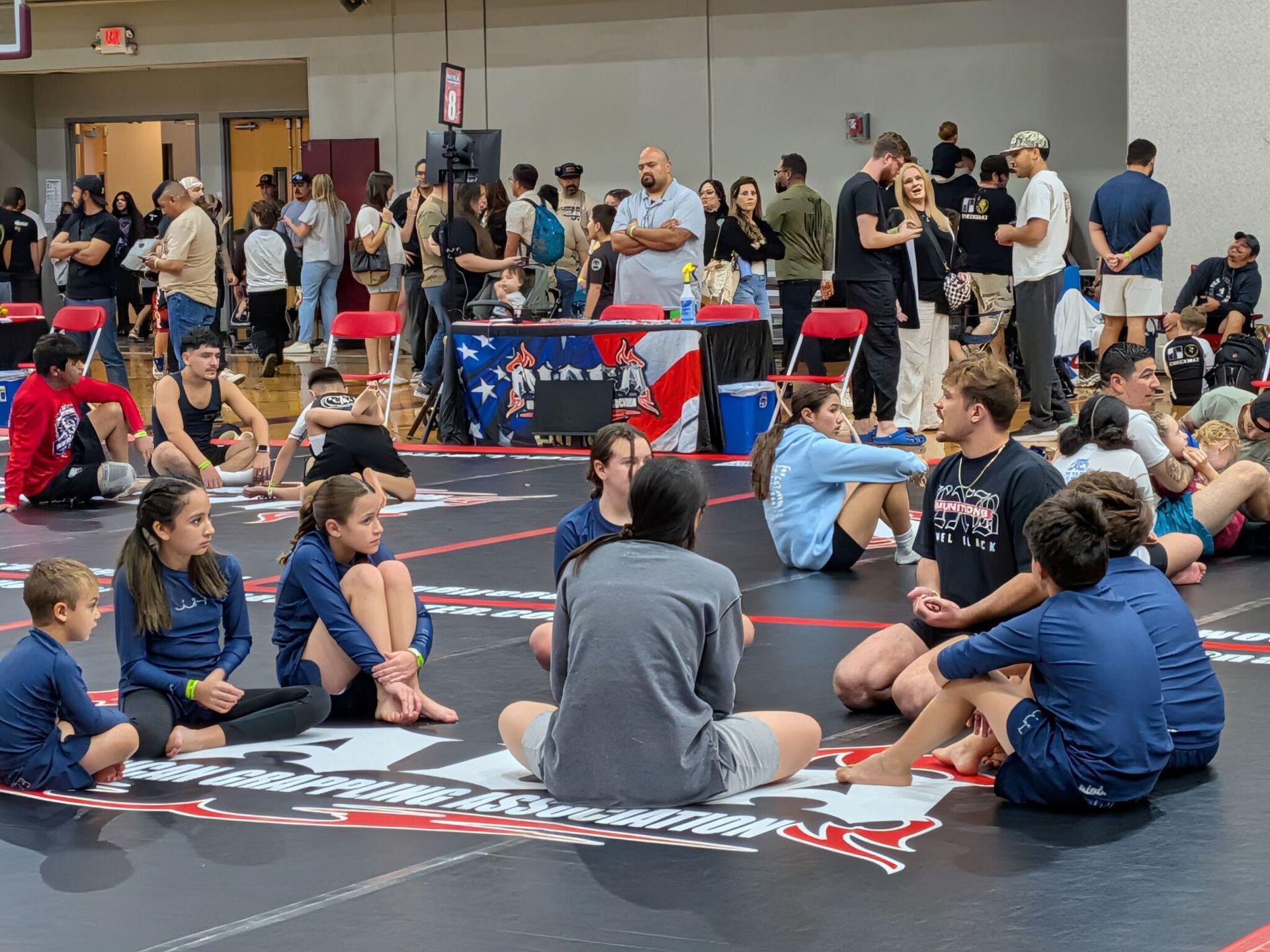 Kids practicing controlled grappling drills at Jiu-Jitsu Hub in Georgetown, Texas.