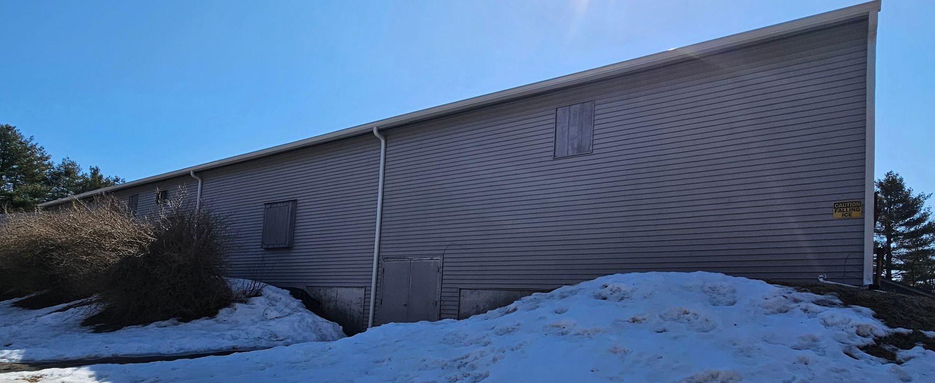 Completed six inch seamless gutter system installed on Monadnock Tennis Club in Peterborough New Hampshire by New England Gutter Systems