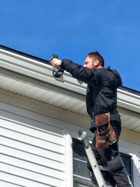 Marine environment-resistant seamless gutter installation on oceanfront house in NH