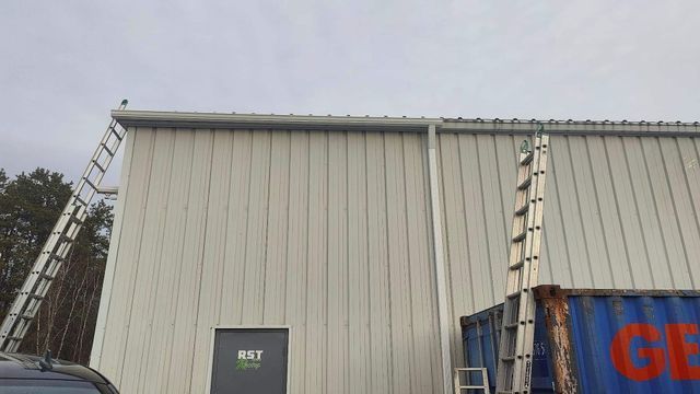 Completed commercial gutter system on New Hampshire building by New England Gutter Systems
