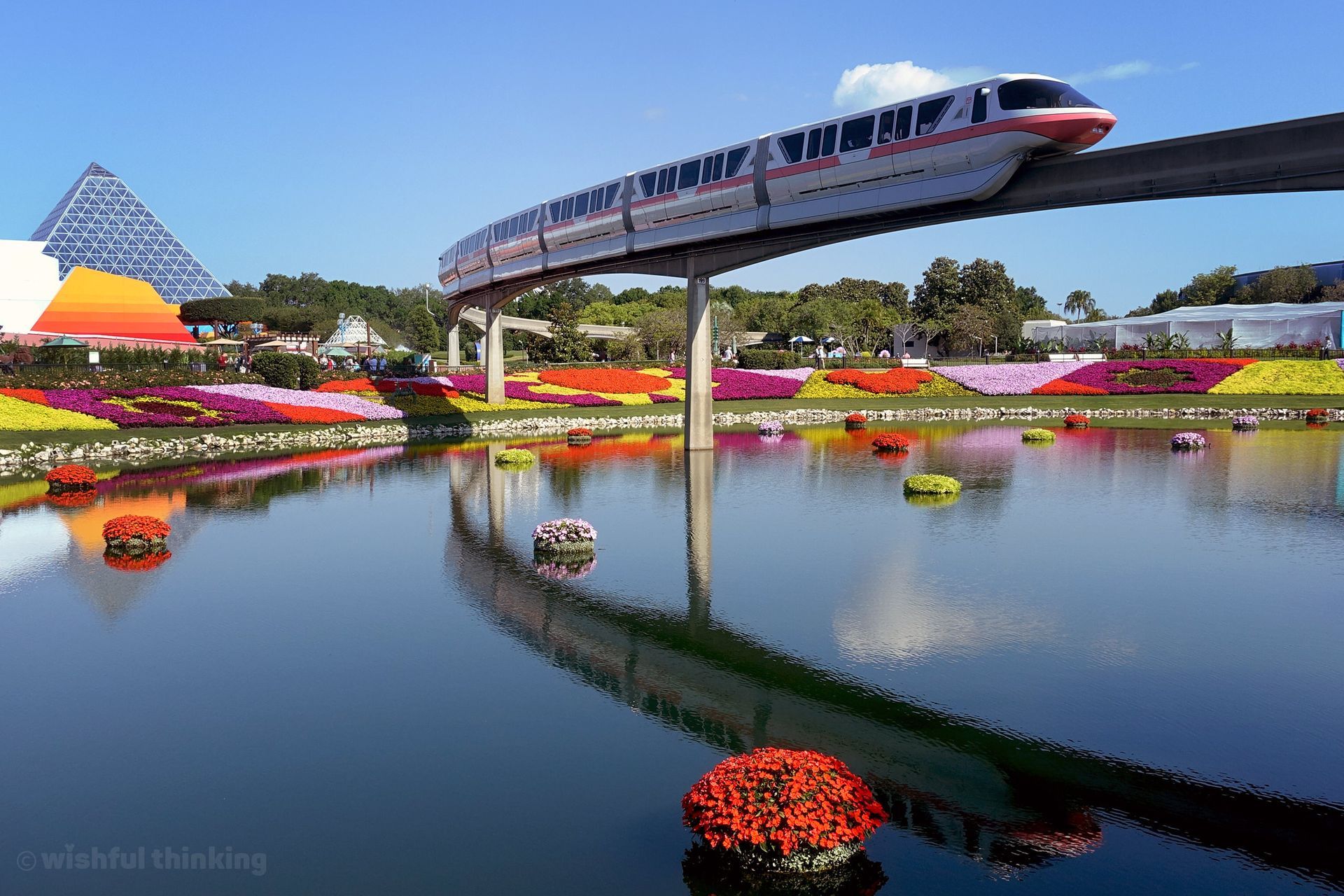 The Walt Disney World monorail streaks across Epcot theme park.