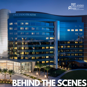 Orlando Health building at dusk, blue-lit with 