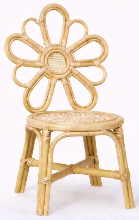 Light wicker chair with a flower-shaped backrest and woven seat on a white background