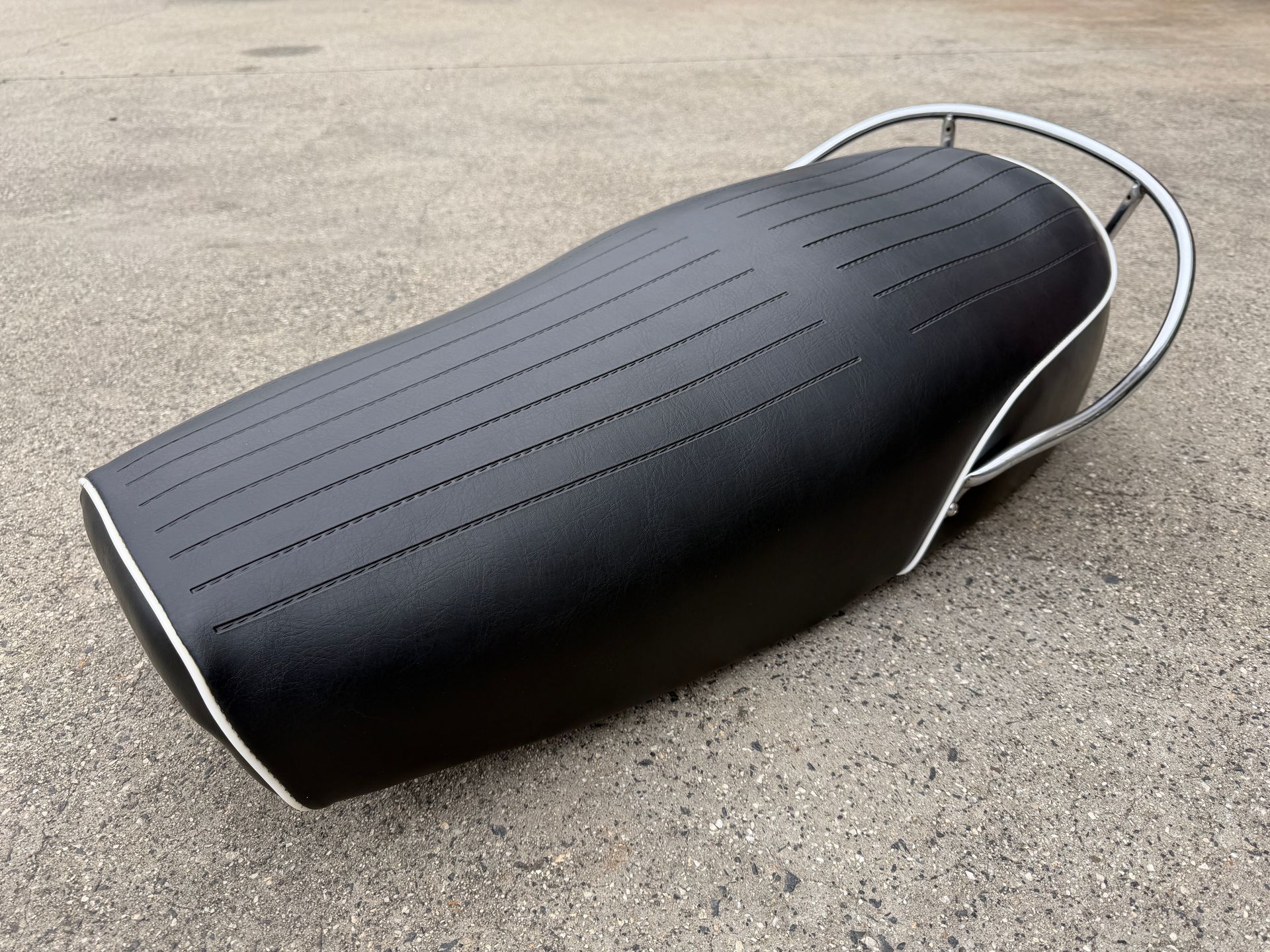 1972 BMW R75 5 motorbike seat install of cover after repairing foam