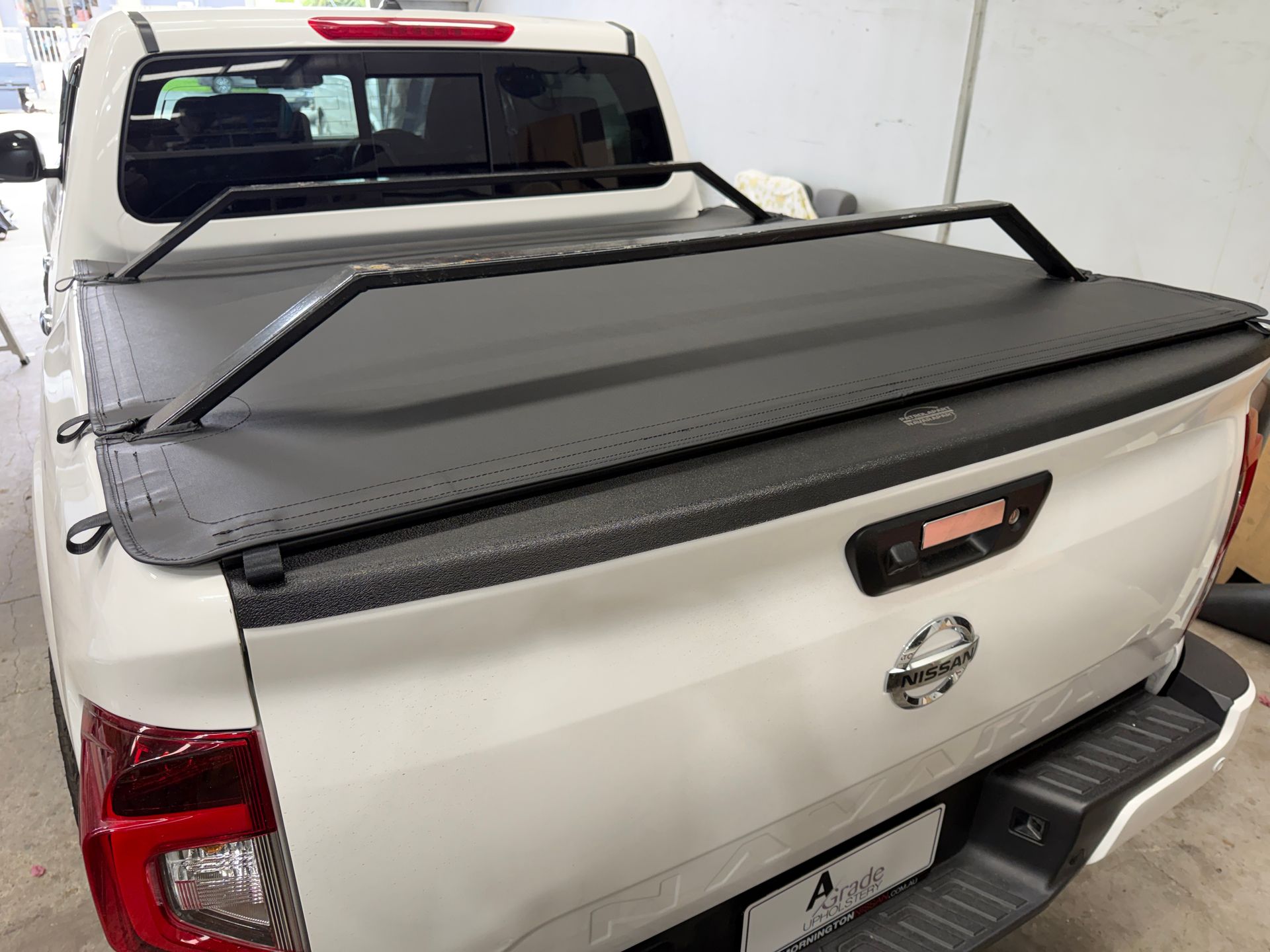 Nissan Navara Slikfit tonneau with tent frame cut outs