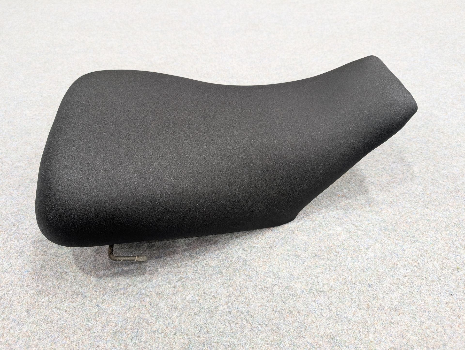 Recover farm bike seat in sandpaper black vinyl