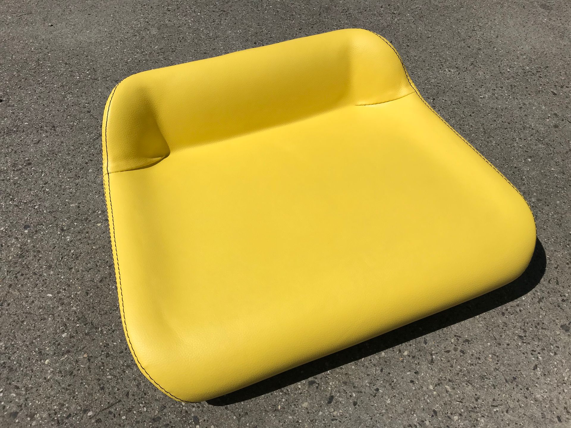 Ride on mower seat