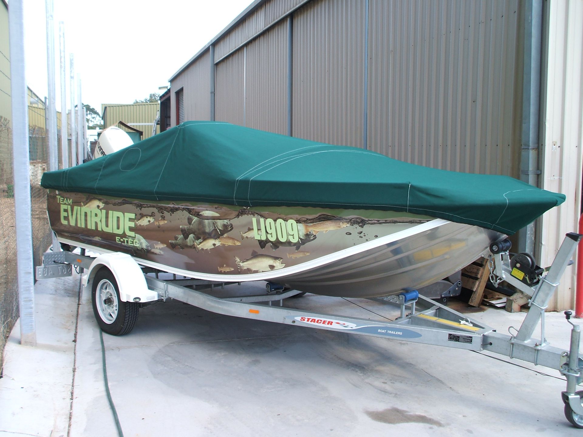 Team Evinrude boat with bag cover
