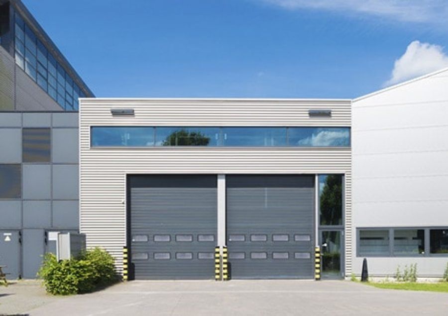 Gray Numbered Business Units Garages — Darwin Roller Door Services In Tivendale NT