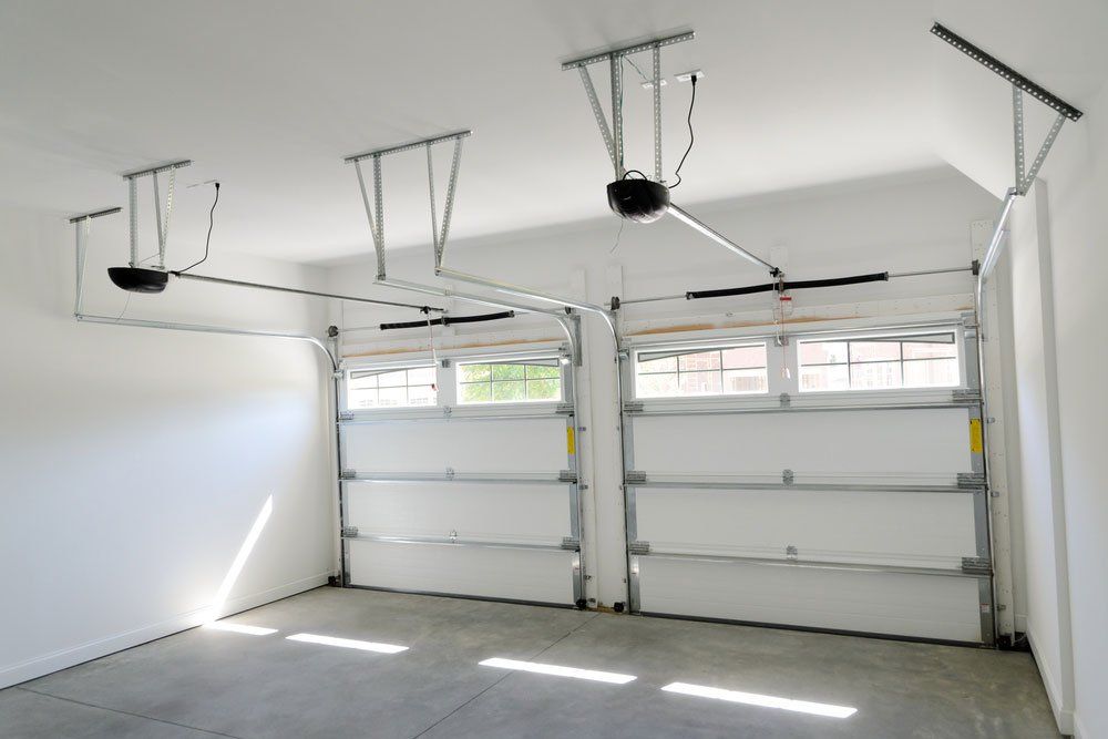 Inside Residential House Two Car Garage Door — Darwin Roller Door Services In Tivendale NT