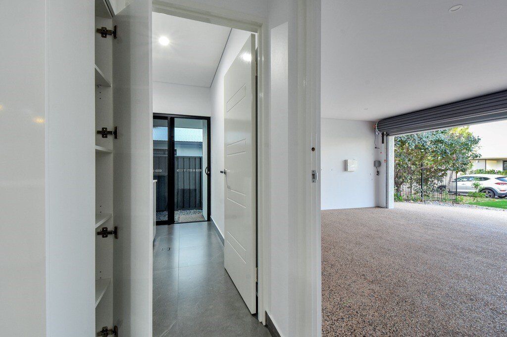 Inside A House Garage Door — Darwin Roller Door Services In Tivendale NT
