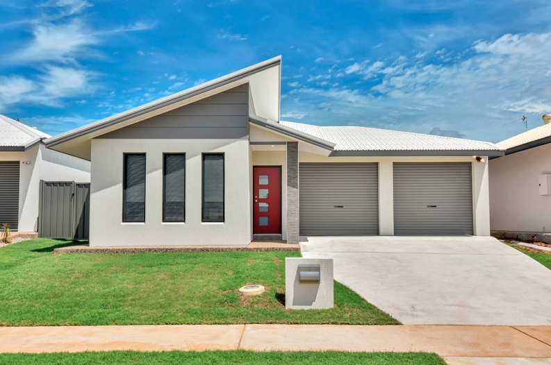 Industrial Warehouse With Red Coller Door — Darwin Roller Door Services In Tivendale NT