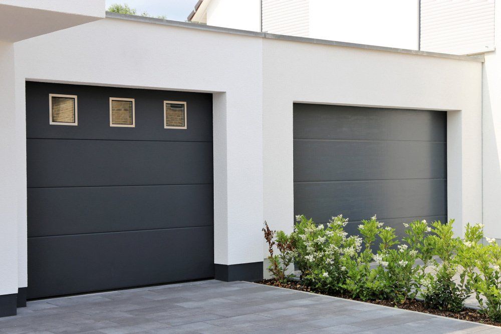 Two Modern New Sectional Garage Doors — Darwin Roller Door Services In Tivendale NT
