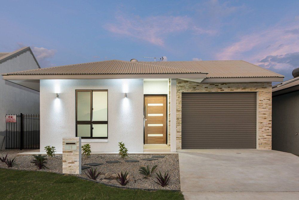 Typical Facade Of A New Modern House With Roller Door — Darwin Roller Door Services In Tivendale NT