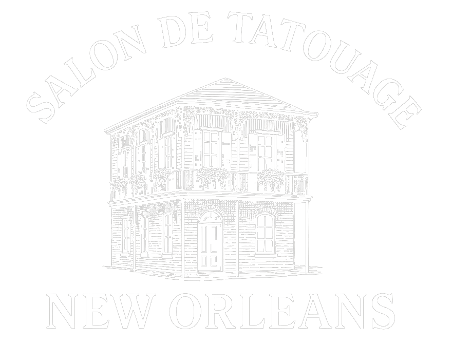 Faint watermark of the New Orleans School of Glassblowing building logo with “New Orleans” text