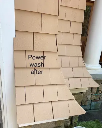 Light tan wood shingles on a building exterior, labeled 