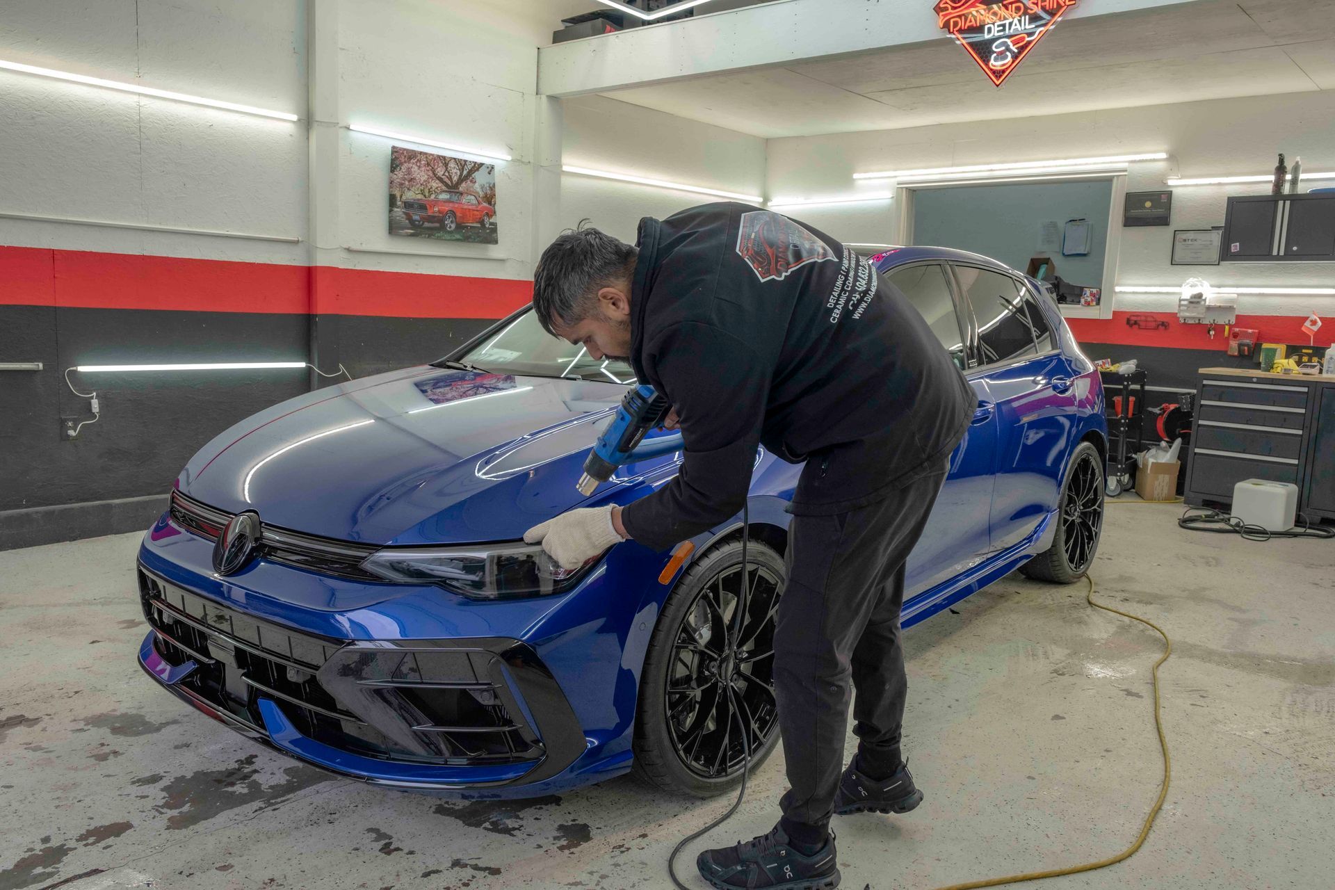 2026 Volkswagen Golf R in metallic blue with full front paint protection film, ceramic coating