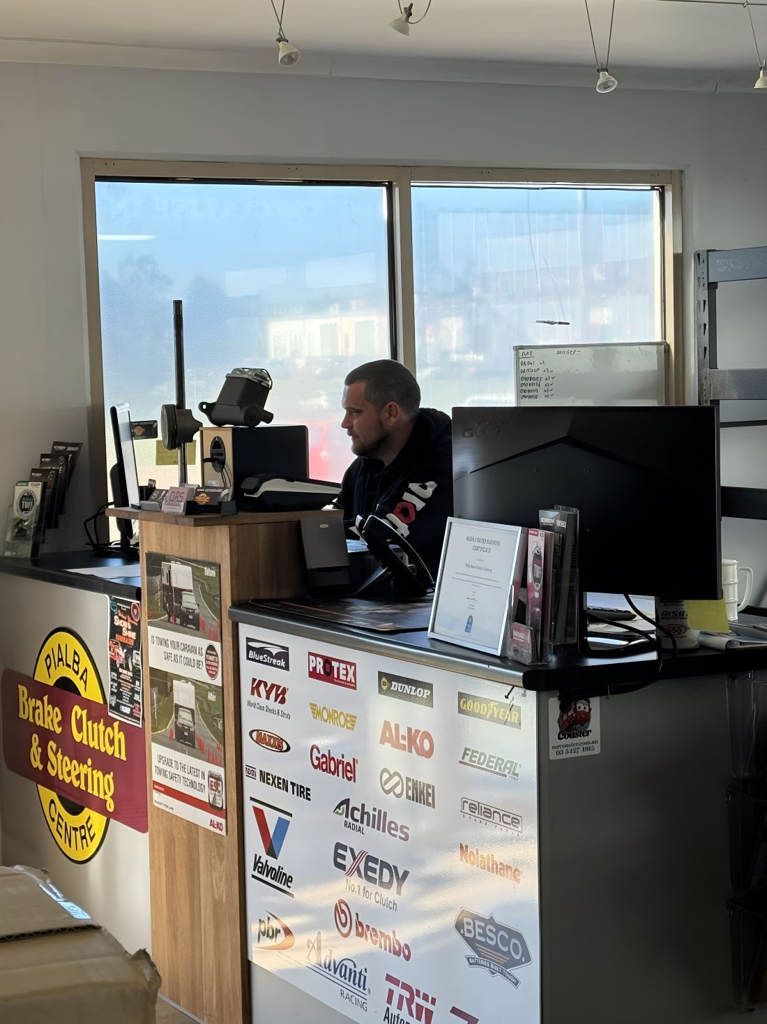 A Service Counter with Computer Monitors — Pialba Brake Clutch & Steering Centre in Pialba, QLD