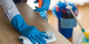 Mop and Blue Bucket with the Detergents in the Background — Newcastle, NSW — HCS Hunter Cleaning Service