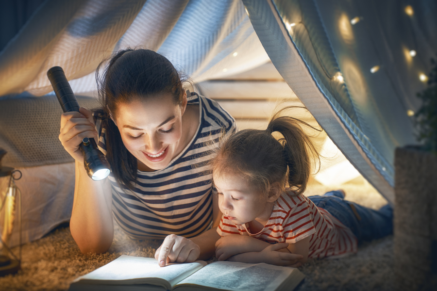 Mother and child reading a book