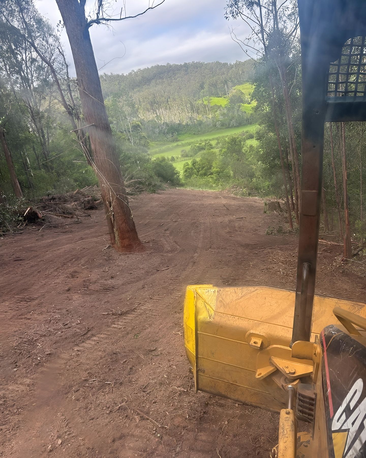 View From Bulldozer Cab, Looking Down Dirt Road — MG Earthworks and Plant Hire in Gumma, NSW