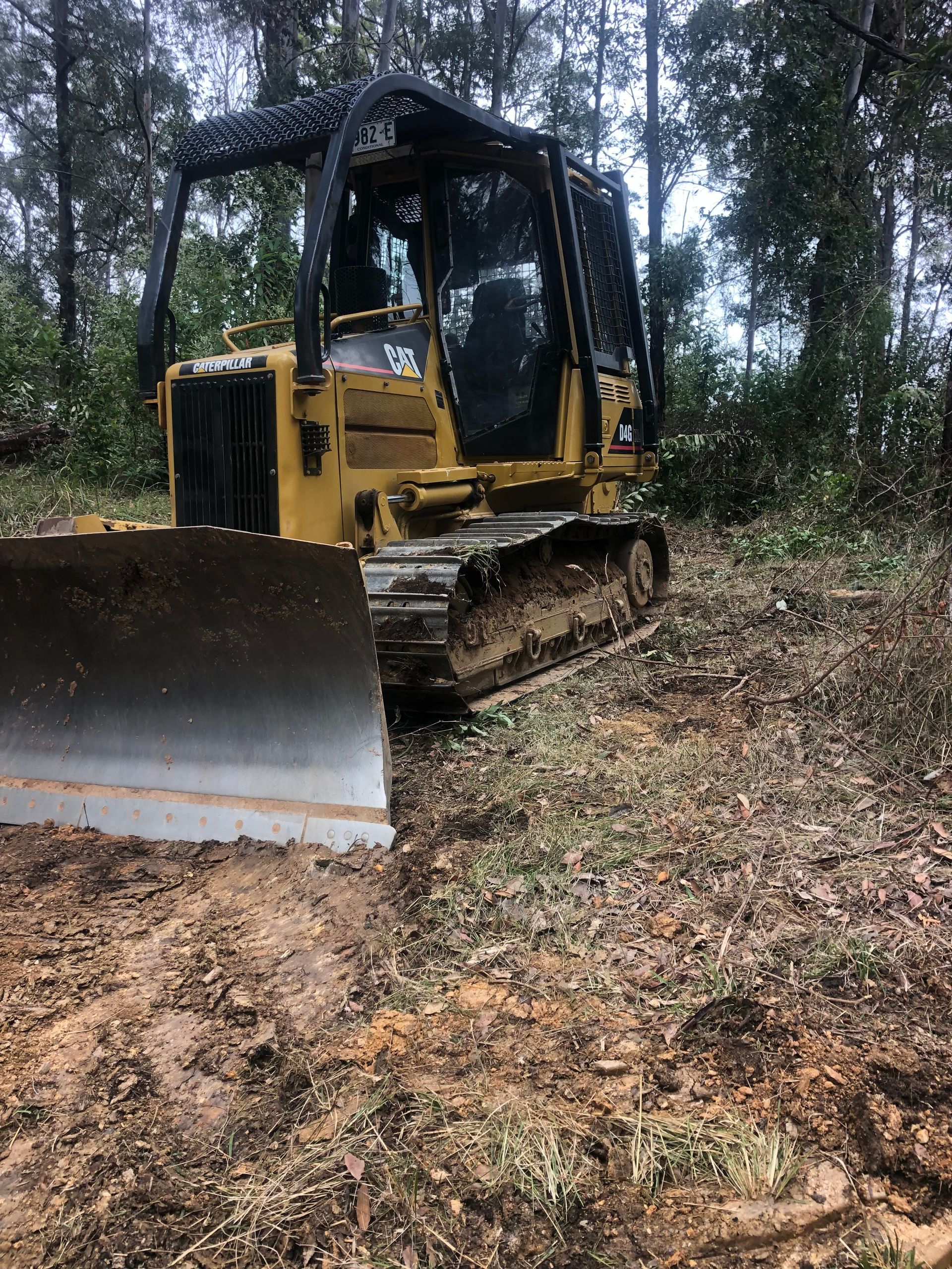 Gravel Driveway Leading to a Rural House With a Porch on a Sunny Day — MG Earthworks and Plant Hire in Gumma, NSW