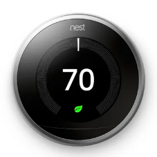 Nest thermostat displaying 70 degrees with a green leaf icon.