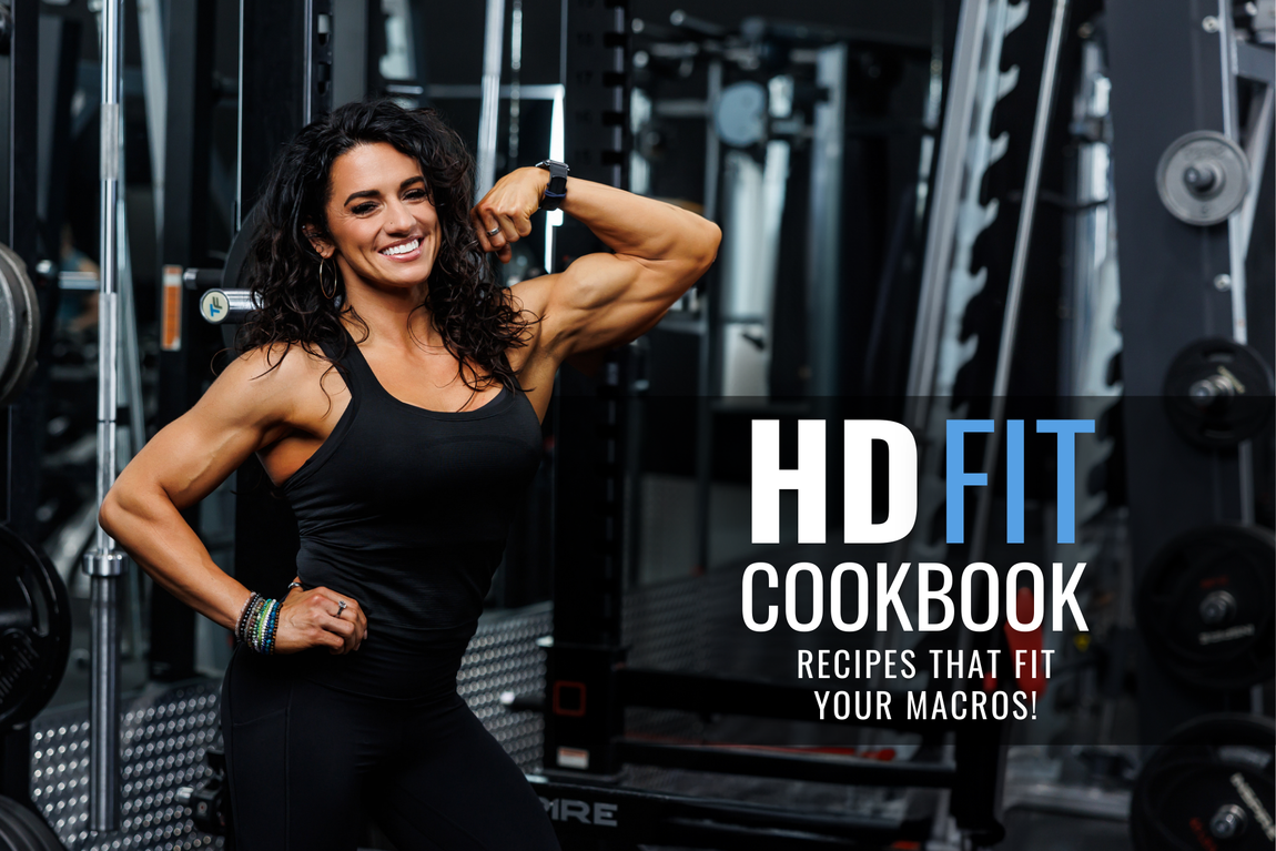 Heather Dees is flexing her muscles in a gym. Cook Book