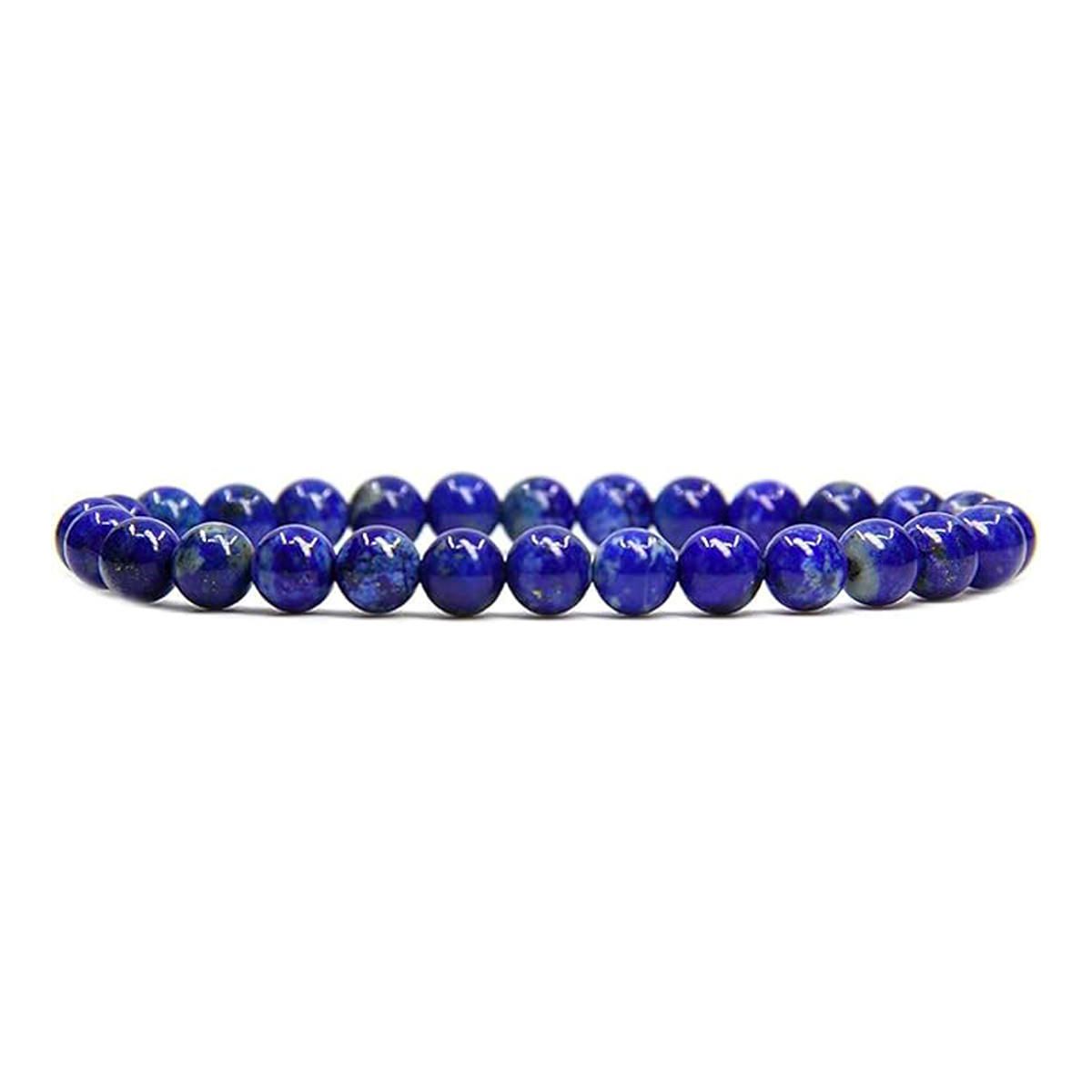 A bracelet made of blue beads on a white background.