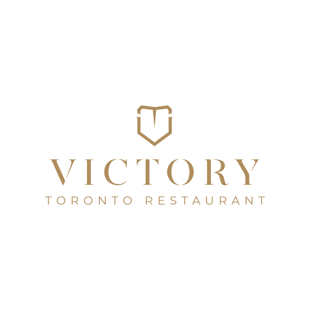 Victory Toronto Restaurant logo in gold on a white background