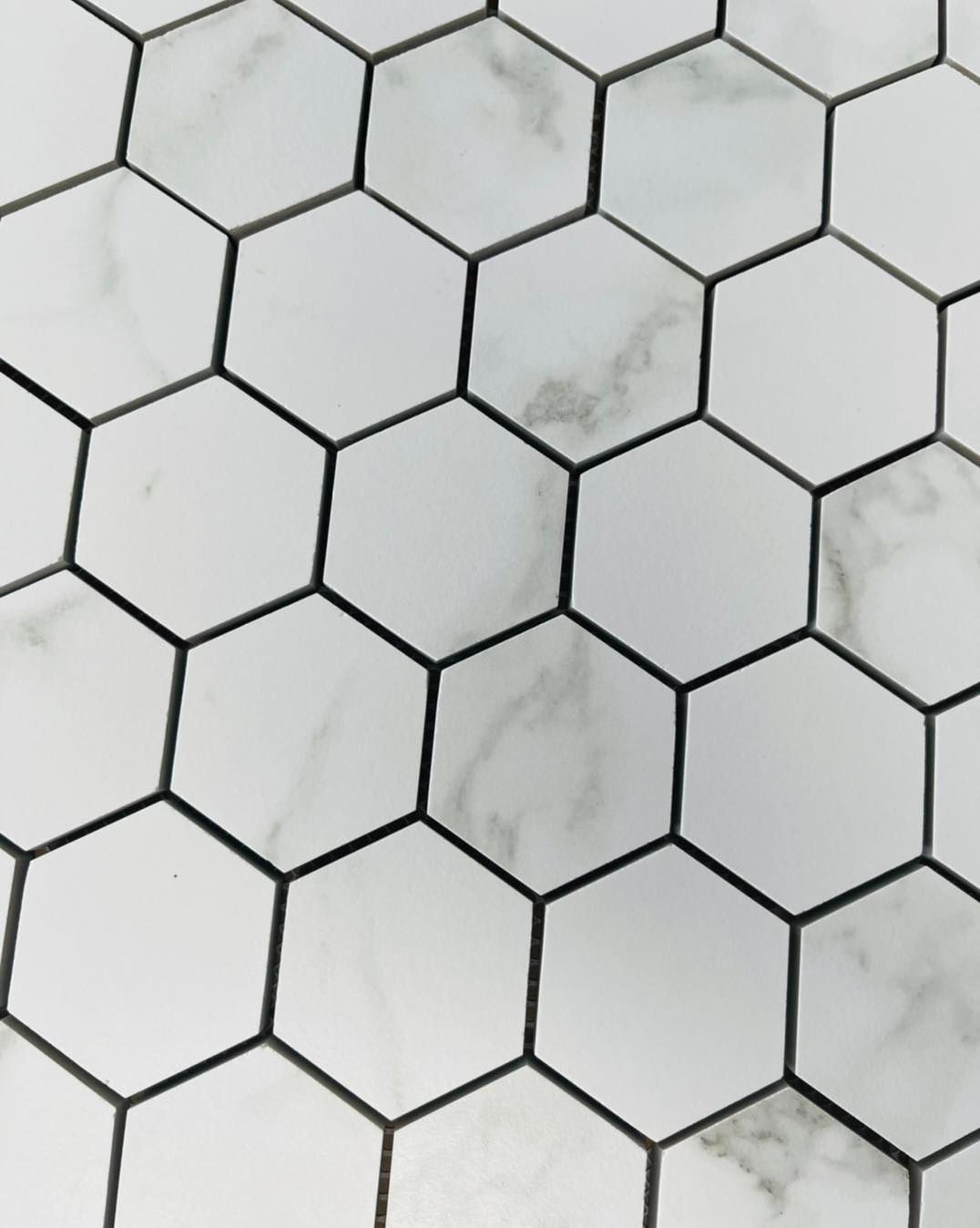 A Close Up Of A Honeycomb Pattern On A Tile Floor โ Tile Centre NT In Winnellie, NT