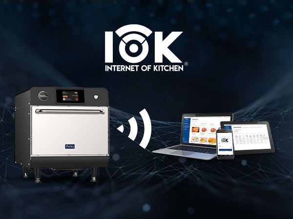 Un horno está conectado a una computadora portátil y a un teléfono celular.