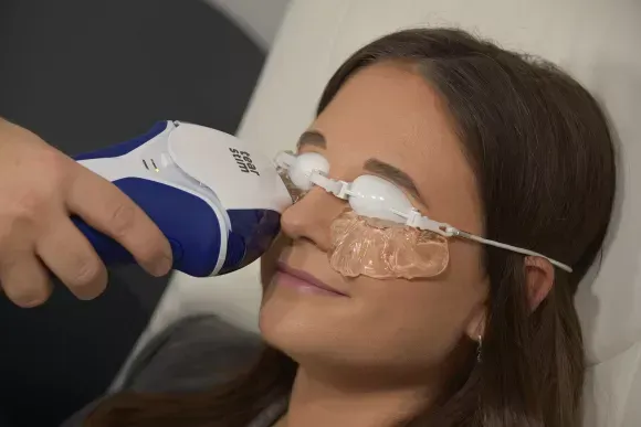 A Doctor Examines a Patient’s Inflamed, Red Eye — Peninsula Eyecare Izzards Optometrists in Woy Woy, NSW