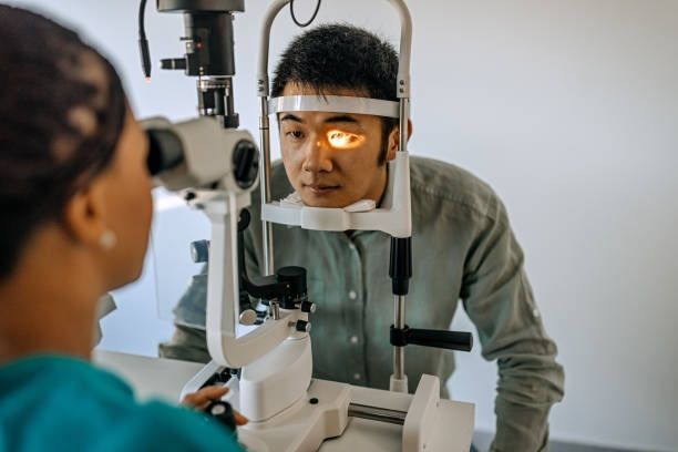 A Person Undergoing a Clinical Eye Examination — Peninsula Eyecare Izzards Optometrists in Woy Woy, NSW