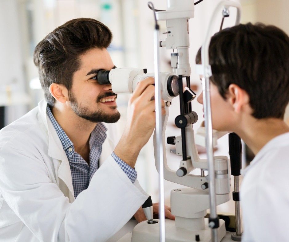 An Optometrist Performs an Eye Examination — Peninsula Eyecare Izzards Optometrists in Woy Woy, NSW