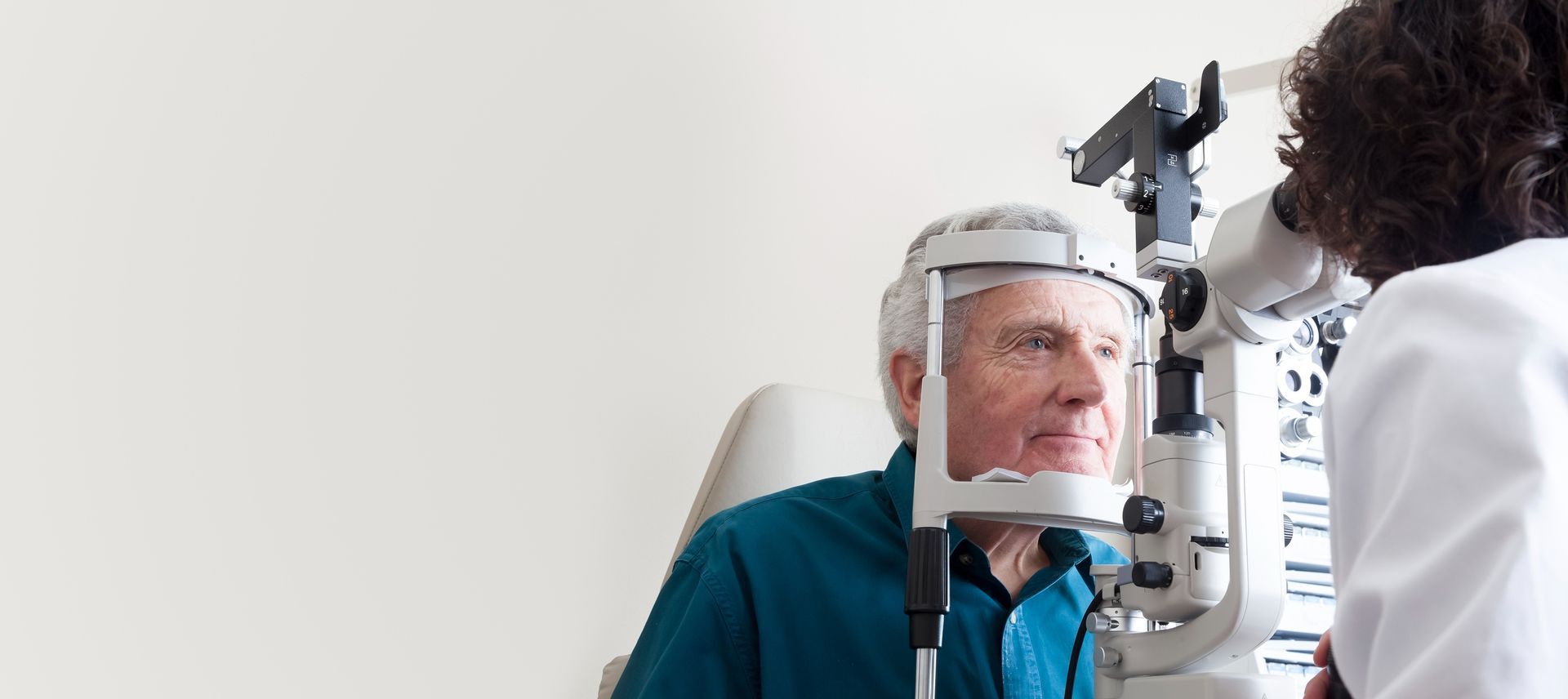 A Medical Professional Uses a Slit-lamp Biomicroscope — Peninsula Eyecare Izzards Optometrists in Woy Woy, NSW