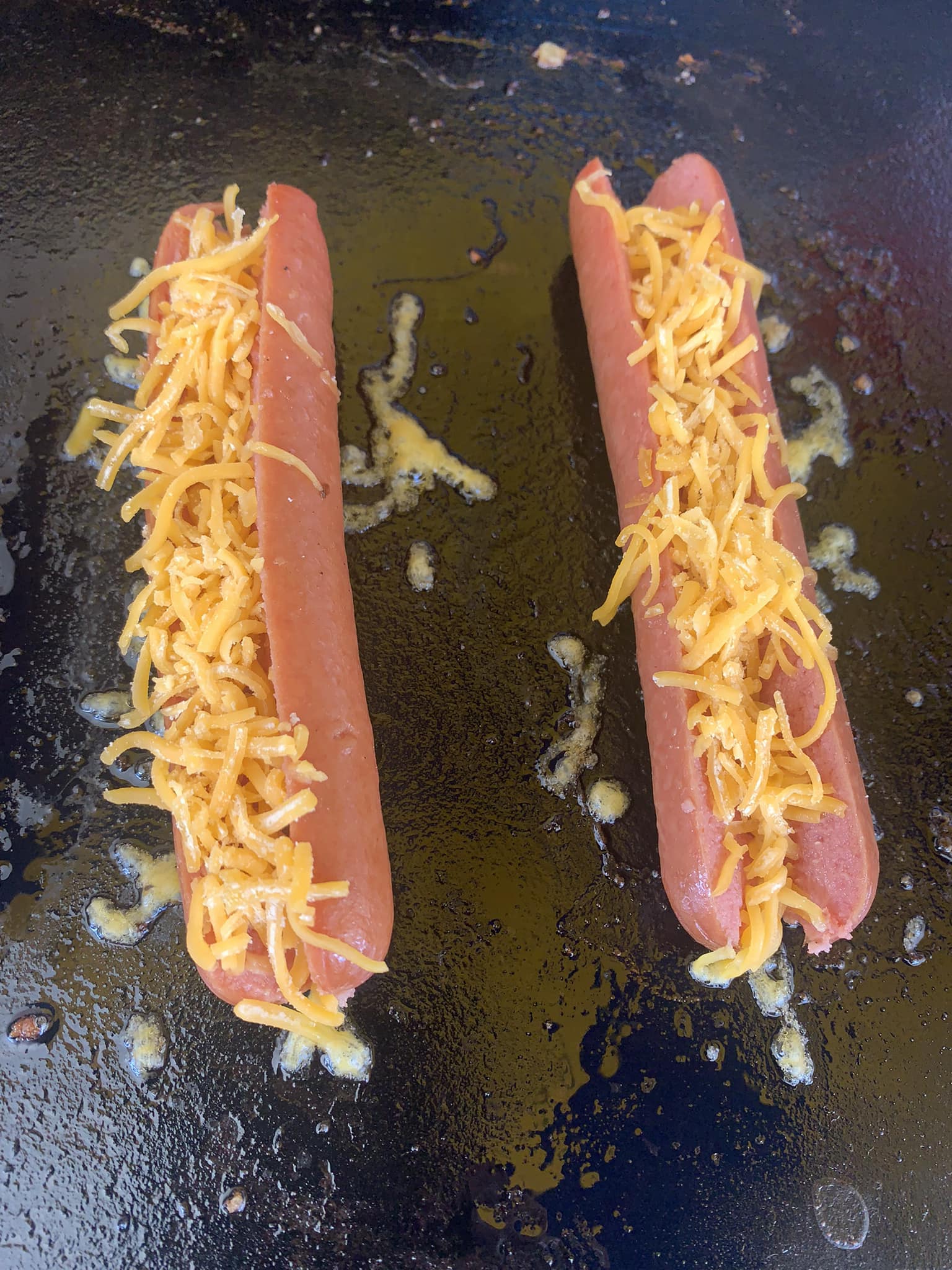 Cooking Cheesy Hotdogs — Orlando, FL — The Hot Dog Guy Catering