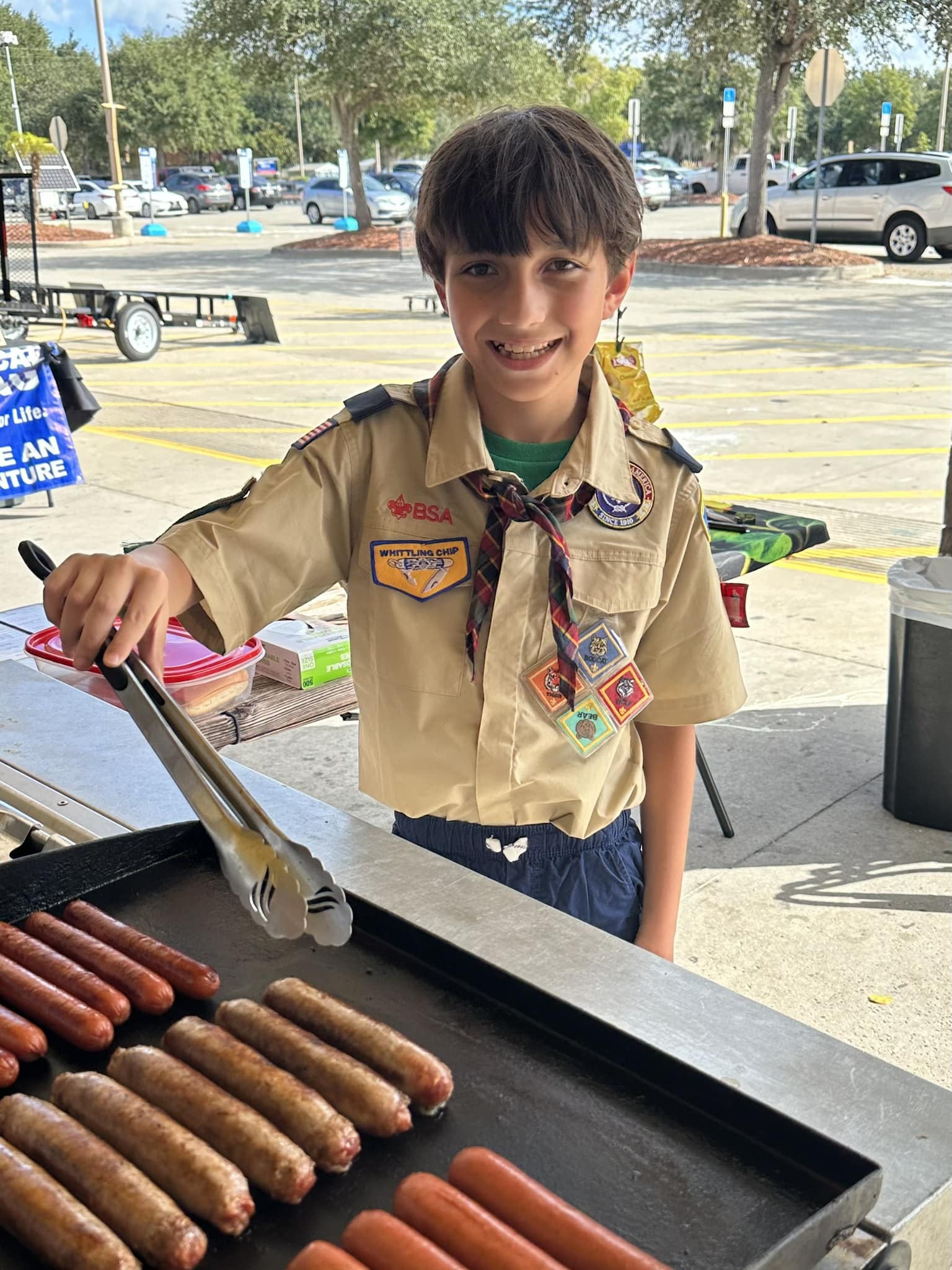 A Kid Cooking Hotdogs — Orlando, FL — The Hot Dog Guy Catering