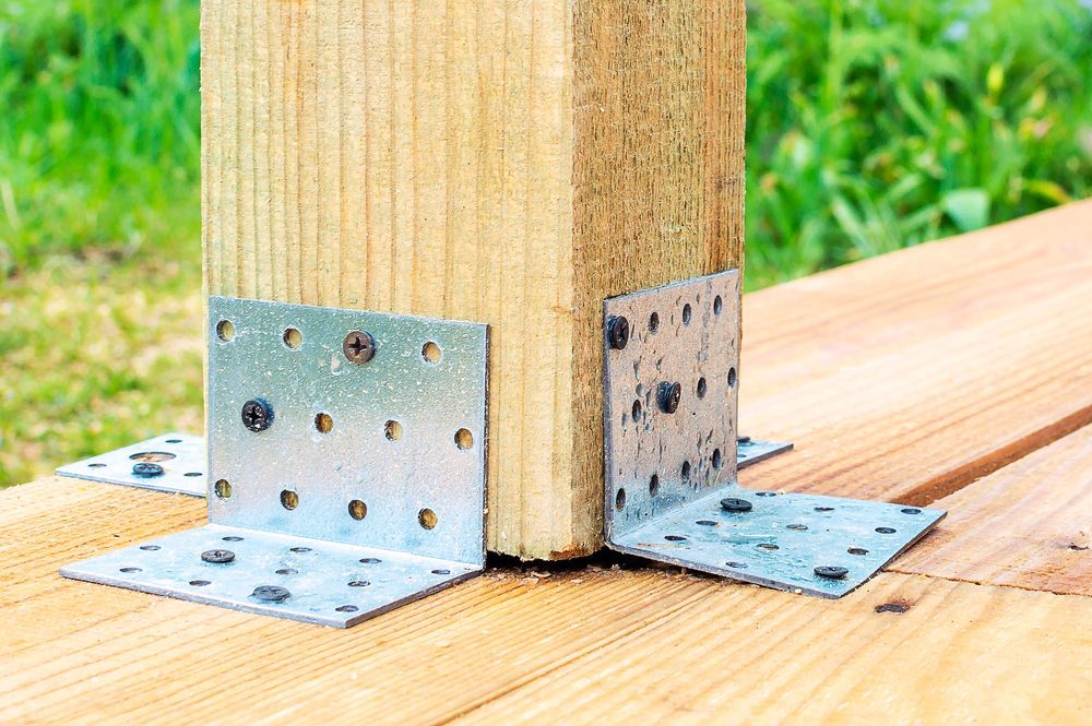 Wooden Post Secured to a Deck With Metal Corner Brackets — Wilko Plate (Aust) Pty Ltd in Annandale, QLD