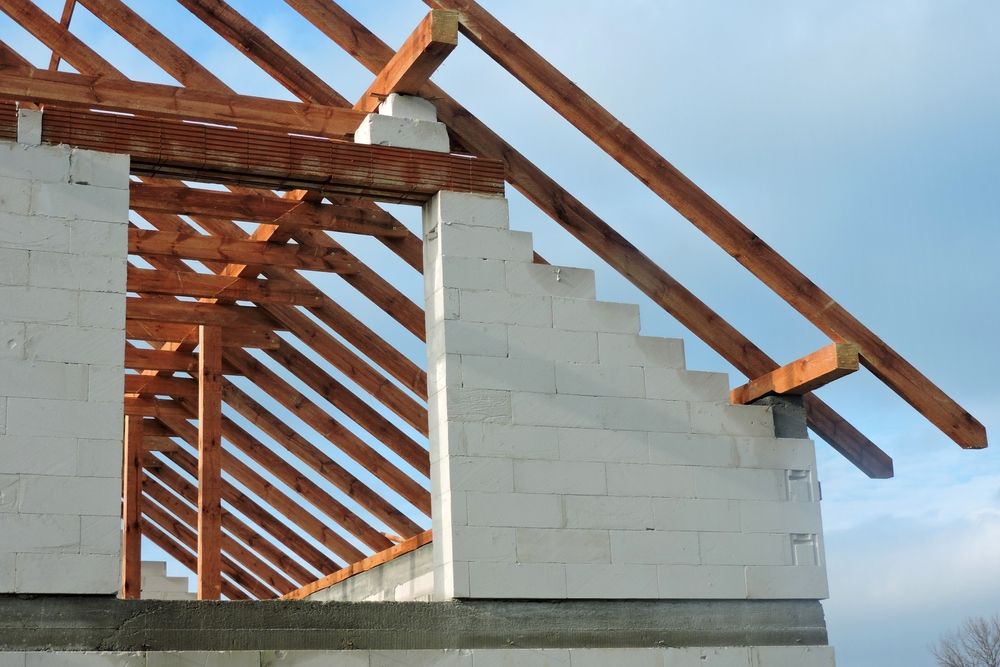 Construction of a Building With a Wooden Roof — Wilko Plate (Aust) Pty Ltd in Townsville, QLD