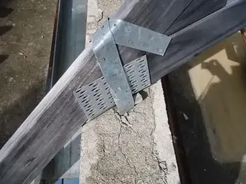Metal Brackets Securing a Wooden Beam — Wilko Plate (Aust) Pty Ltd in Annandale, QLD