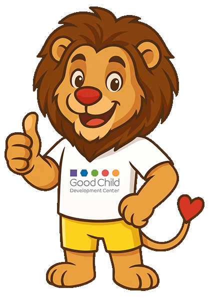 Cartoon lion mascot in a white shirt and yellow shorts, smiling and giving a thumbs-up.