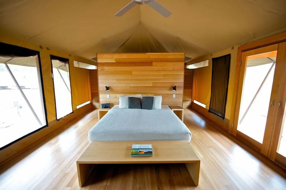 A Building With a Sign That Says Designer Kitchens — Designer Kitchens in Berrimah, NT