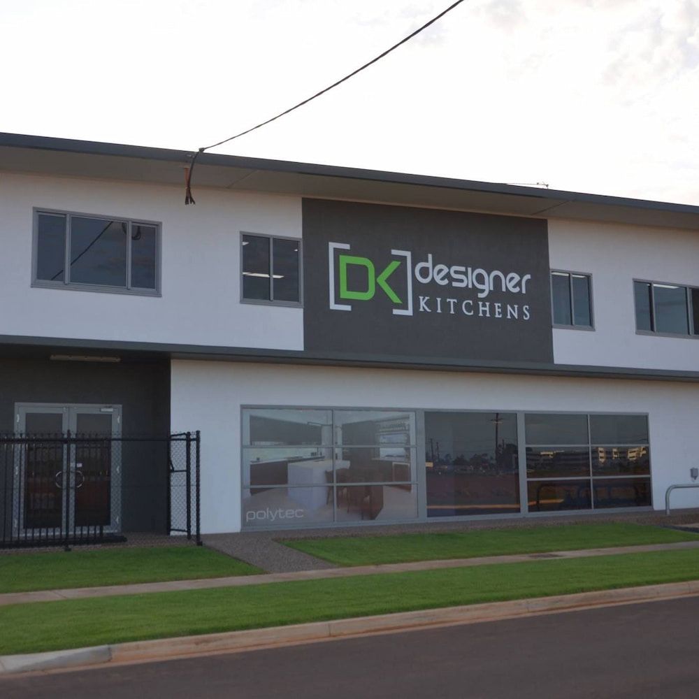 Building With Sign That Says Designer Kitchens — Designer Kitchens in Berrimah, NT