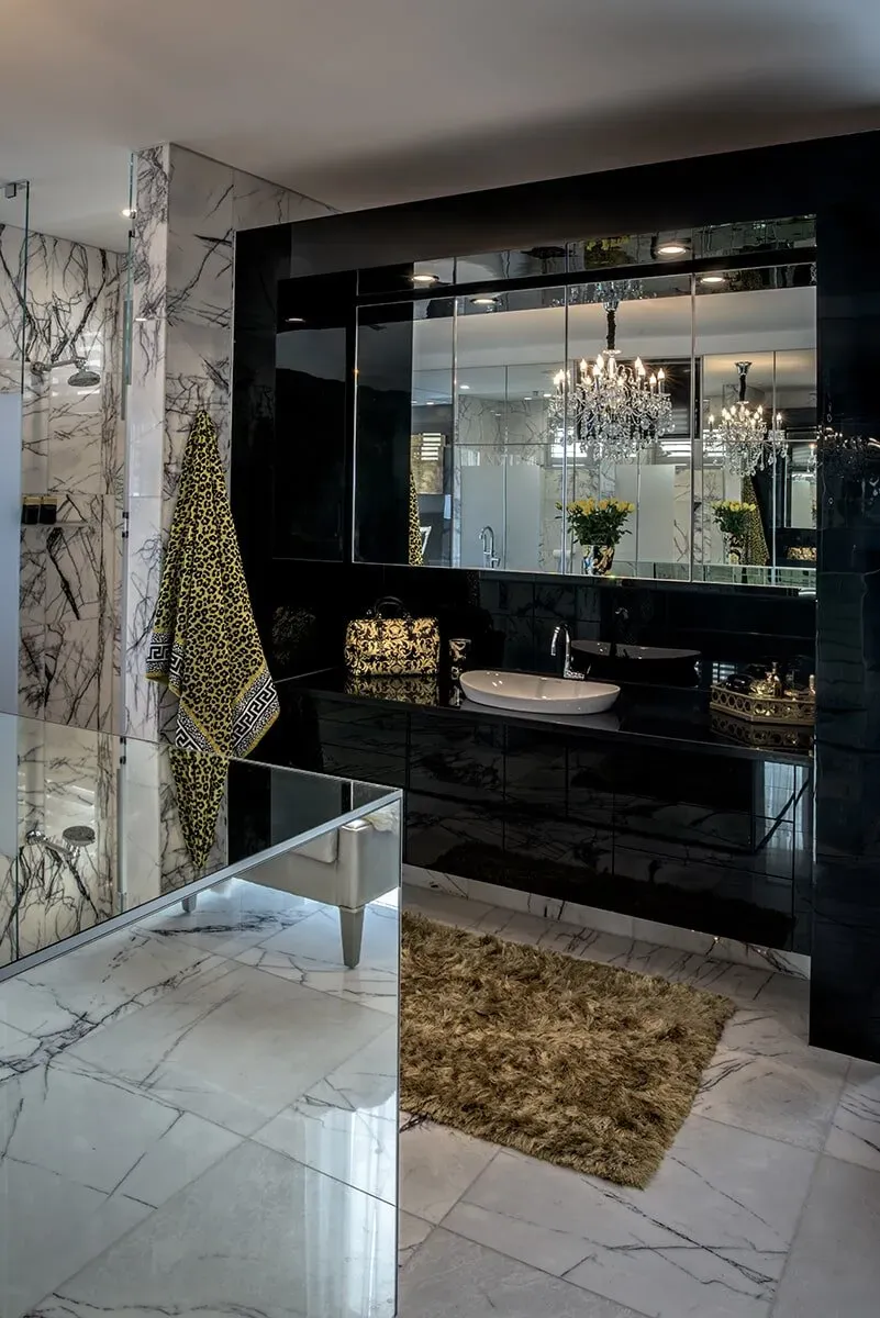 A Bathroom With a Sink, Mirror and Shower — Designer Kitchens in Berrimah, NT